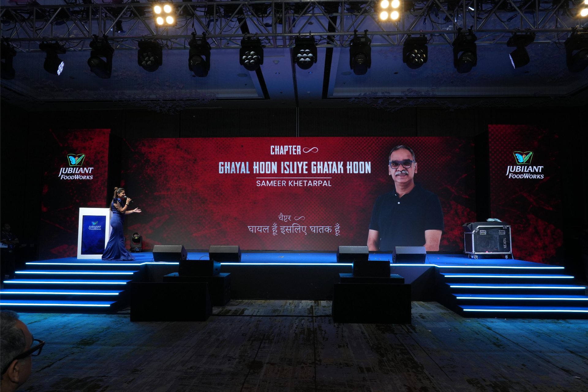Themed chapter session staged against a red LED backdrop during the ISC Bootcamp programme
